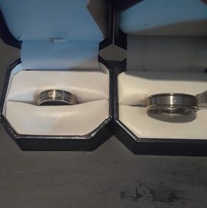 Man and Woman's matching titanium and gold wedding